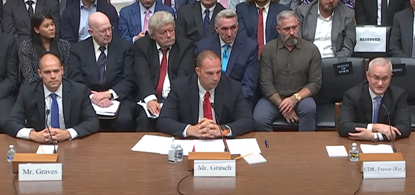 Witnesses at the 26 July 2023 congressional UAP hearing, with George Knapp and Jeremy Corbell in the row behind.